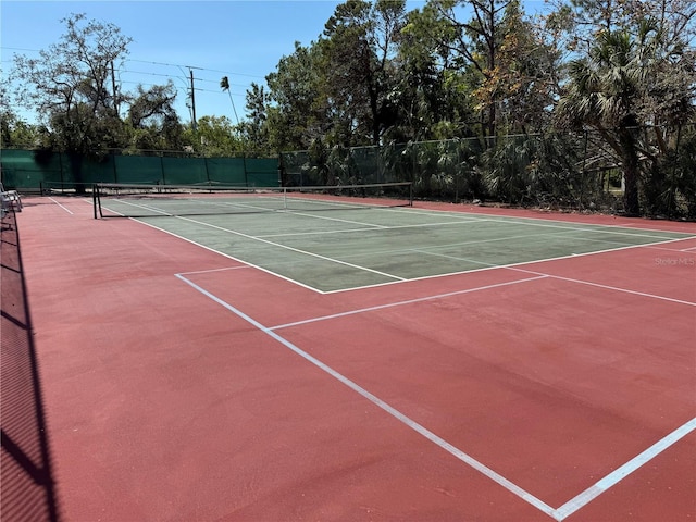 view of sport court with community basketball court and fence