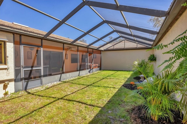 view of yard with a lanai