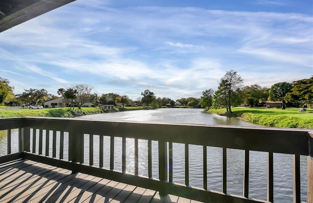 deck featuring a water view