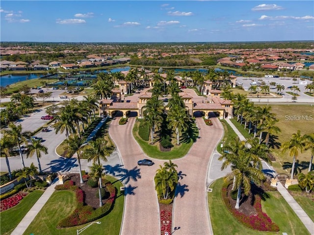 aerial view with a water view and a residential view