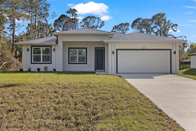 ranch-style home with driveway, metal roof, an attached garage, a standing seam roof, and a front lawn