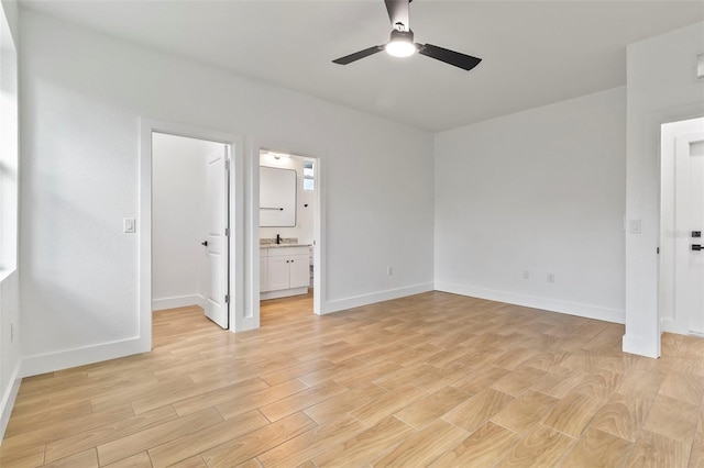 unfurnished bedroom with light wood-style floors and baseboards