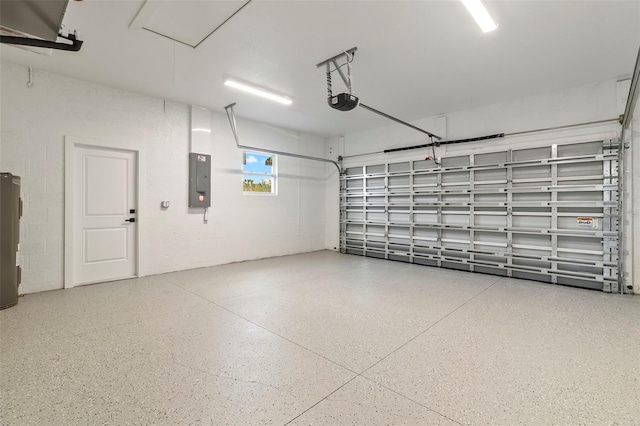 garage with water heater, concrete block wall, electric panel, and a garage door opener