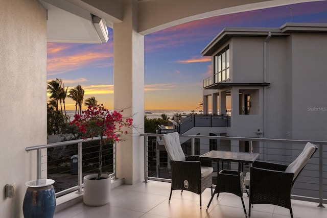 view of balcony at dusk