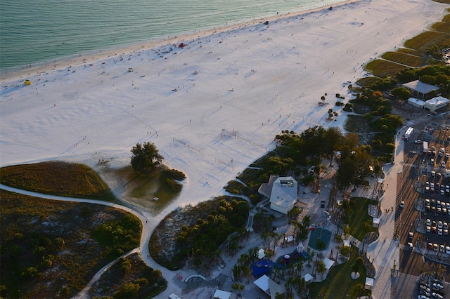 aerial view featuring a water view and a view of the beach