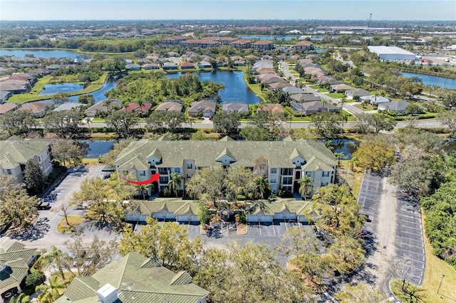 aerial view with a water view and a residential view