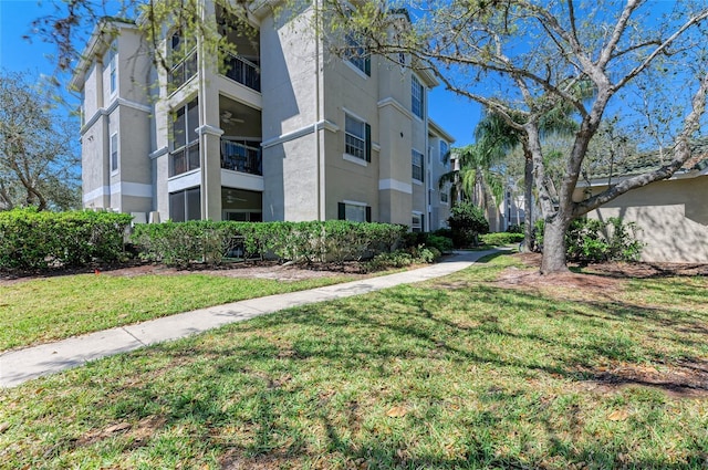 surrounding community featuring a yard