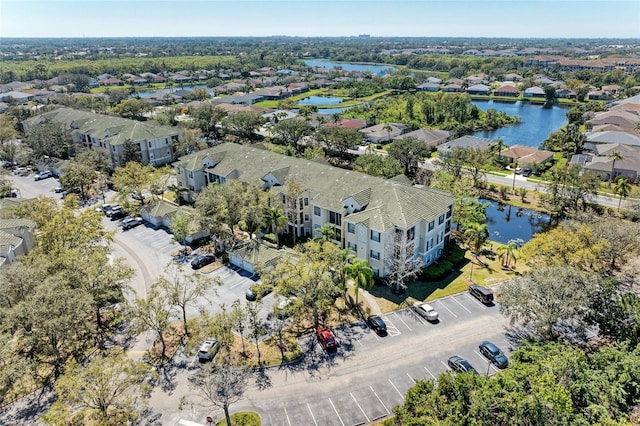 aerial view featuring a residential view and a water view