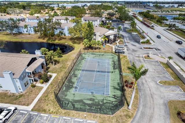 aerial view featuring a water view and a residential view