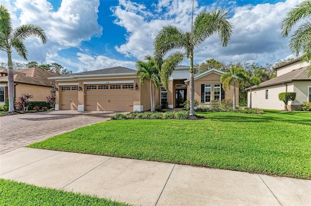 ranch-style home with decorative driveway, an attached garage, a front lawn, and stucco siding