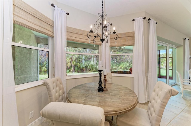 dining area featuring a notable chandelier