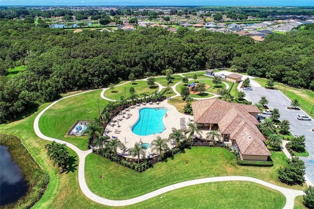 birds eye view of property featuring a water view