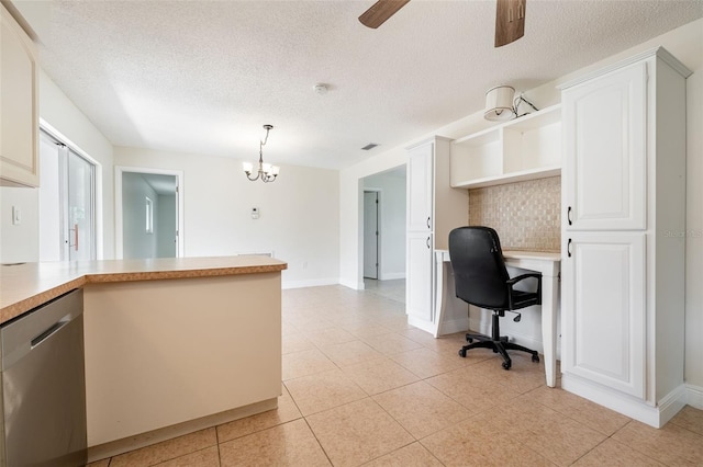 office space featuring ceiling fan with notable chandelier, light tile patterned floors, a textured ceiling, and baseboards