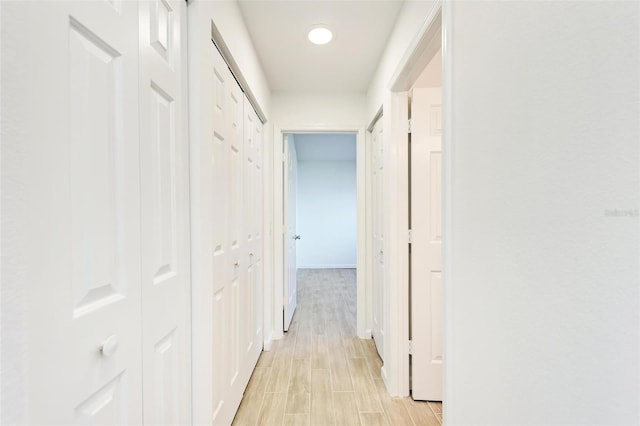 hall featuring wood finish floors