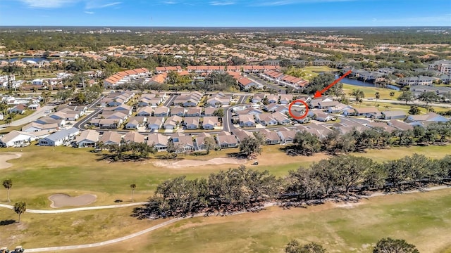 bird's eye view featuring a residential view and golf course view