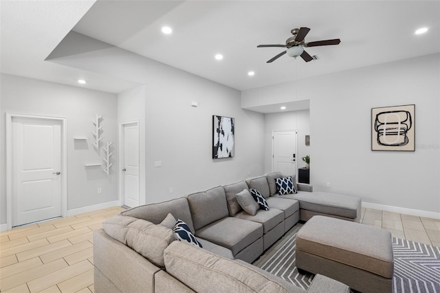 living area with light wood-style floors, recessed lighting, baseboards, and a ceiling fan