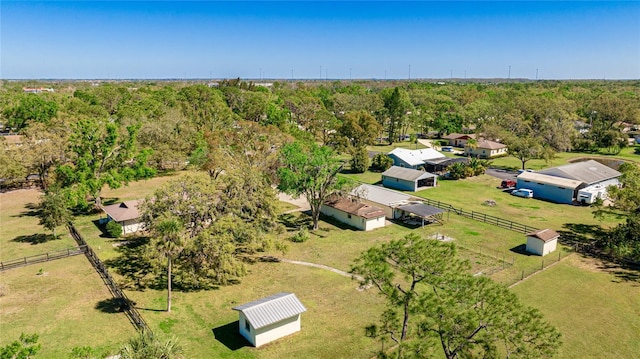 drone / aerial view with a view of trees