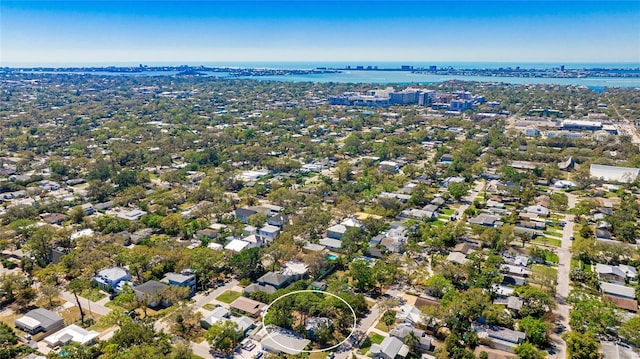 birds eye view of property with a residential view and a water view