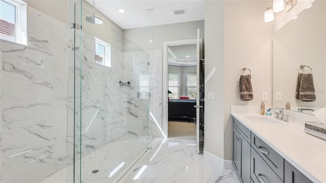 bathroom with marble finish floor, a marble finish shower, visible vents, connected bathroom, and vanity