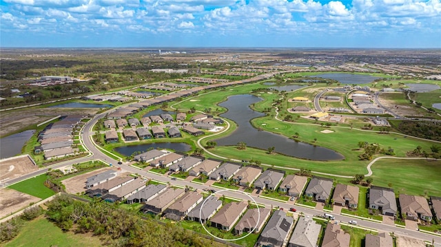 aerial view featuring a water view and a residential view