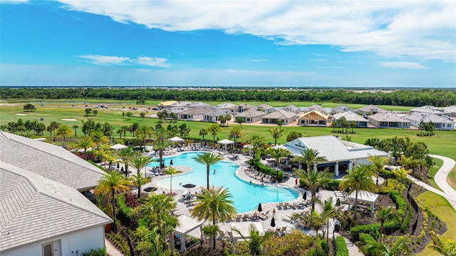 aerial view of residential area with a pool