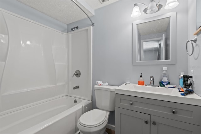 full bath with tub / shower combination, a textured ceiling, toilet, and vanity