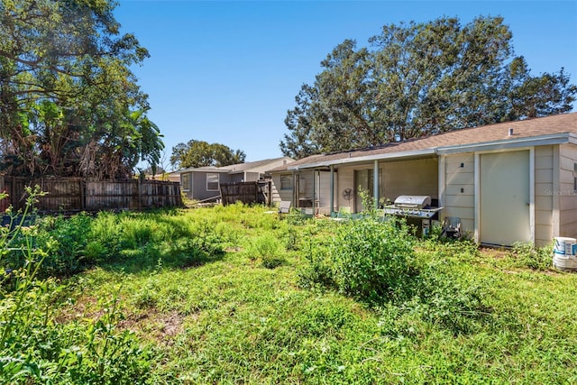 view of yard with fence