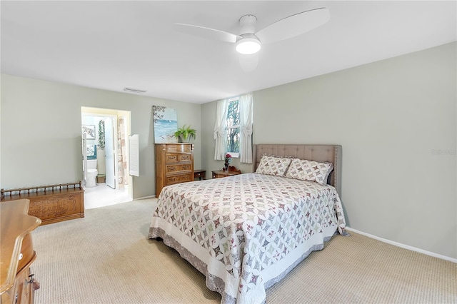 carpeted bedroom with baseboards, visible vents, and ceiling fan