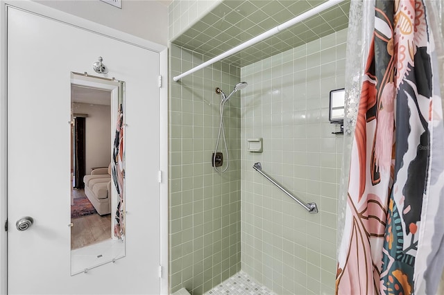 bathroom with a shower stall