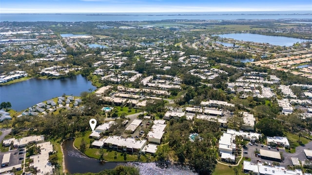 drone / aerial view featuring a water view