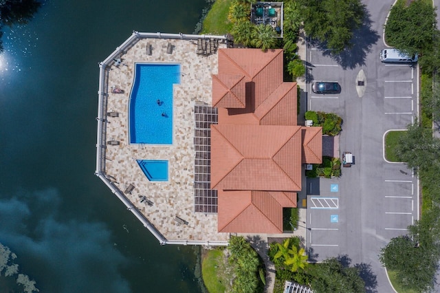 bird's eye view with a water view