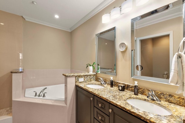 full bathroom featuring a sink, a garden tub, double vanity, and crown molding