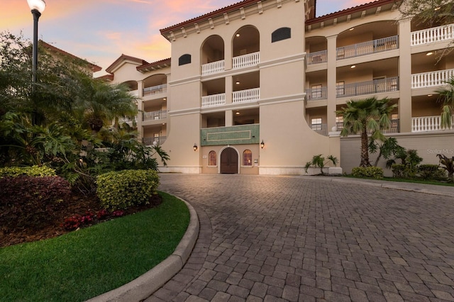 view of property at dusk