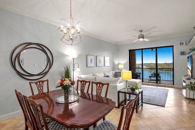 dining room featuring light tile patterned floors, ceiling fan with notable chandelier, baseboards, and ornamental molding