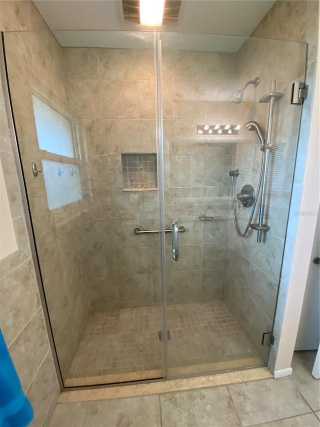 full bathroom with a stall shower