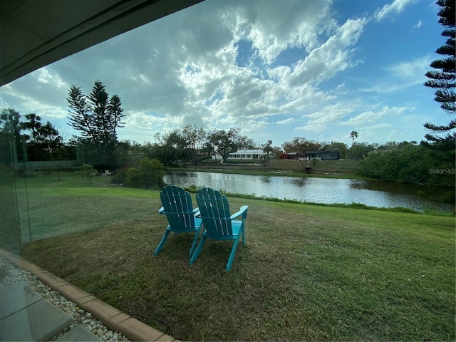 view of yard with a water view