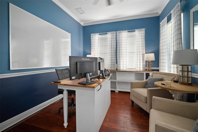 office area with hardwood / wood-style floors, crown molding, visible vents, and baseboards