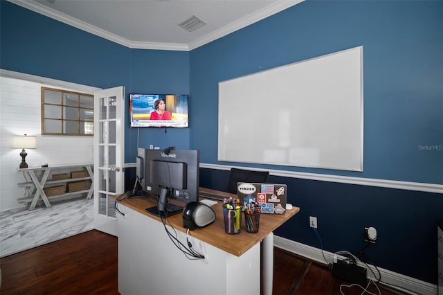 home office featuring visible vents, baseboards, ornamental molding, french doors, and wood finished floors