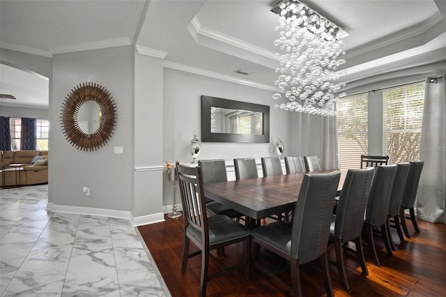 dining area with marble finish floor, arched walkways, crown molding, baseboards, and a chandelier