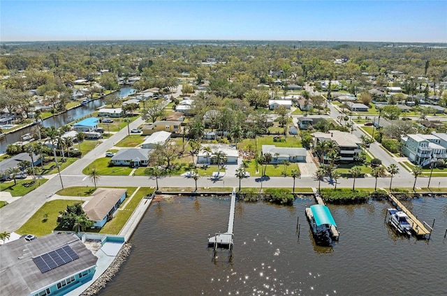 aerial view with a water view and a residential view