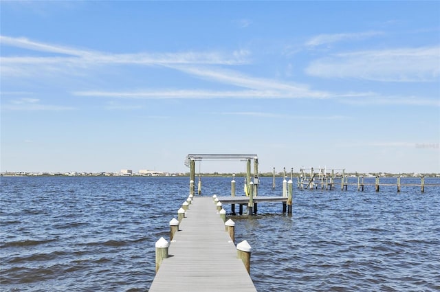 view of dock with a water view