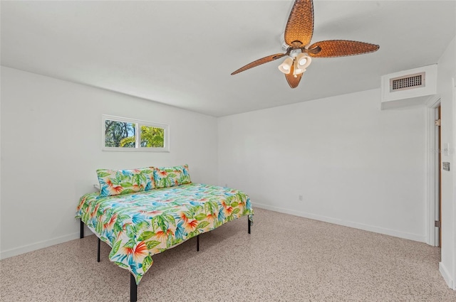 bedroom with baseboards, visible vents, and ceiling fan