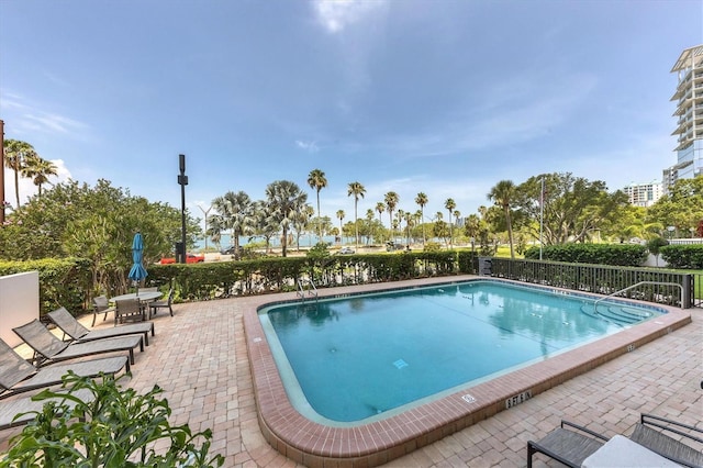 pool with a patio area