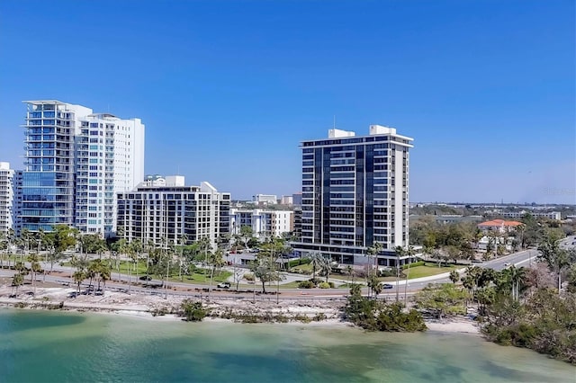 bird's eye view with a view of city and a water view