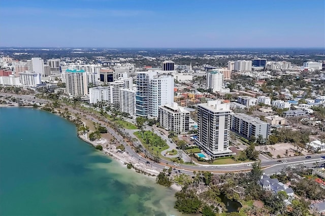 drone / aerial view with a water view and a city view