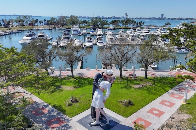 birds eye view of property with a water view