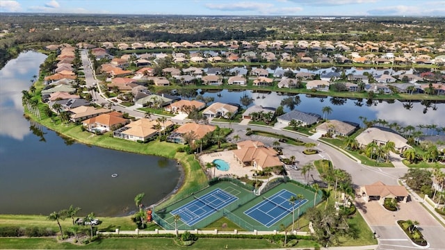 bird's eye view featuring a water view and a residential view