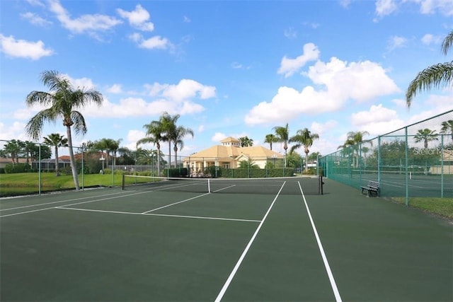 view of sport court with fence