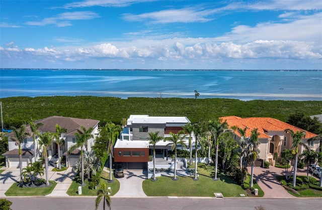 aerial view featuring a water view and a residential view