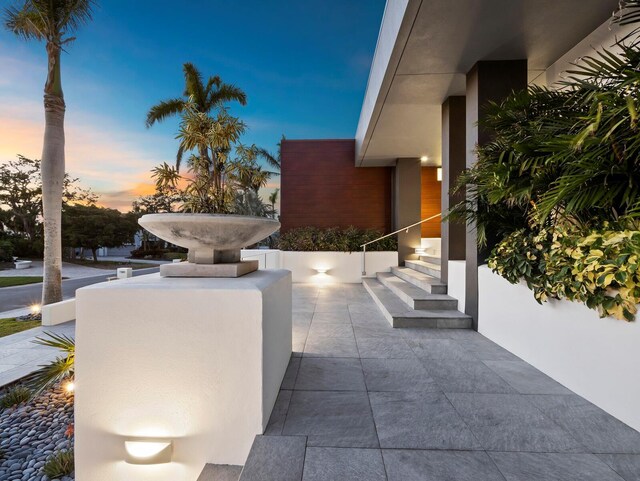 patio terrace at dusk with entry steps